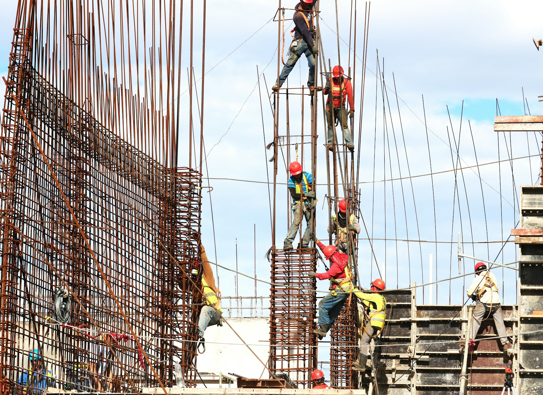 Structural steel framing against sky